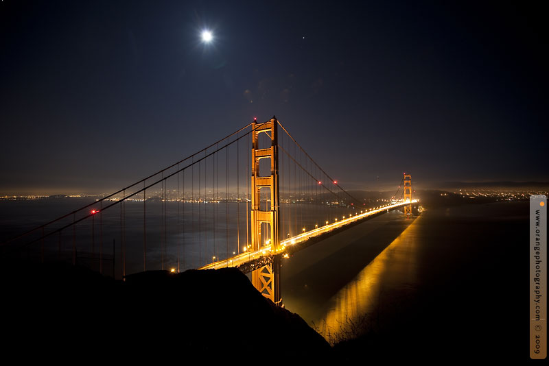 golden gate bridge moon night jupiter stock photo